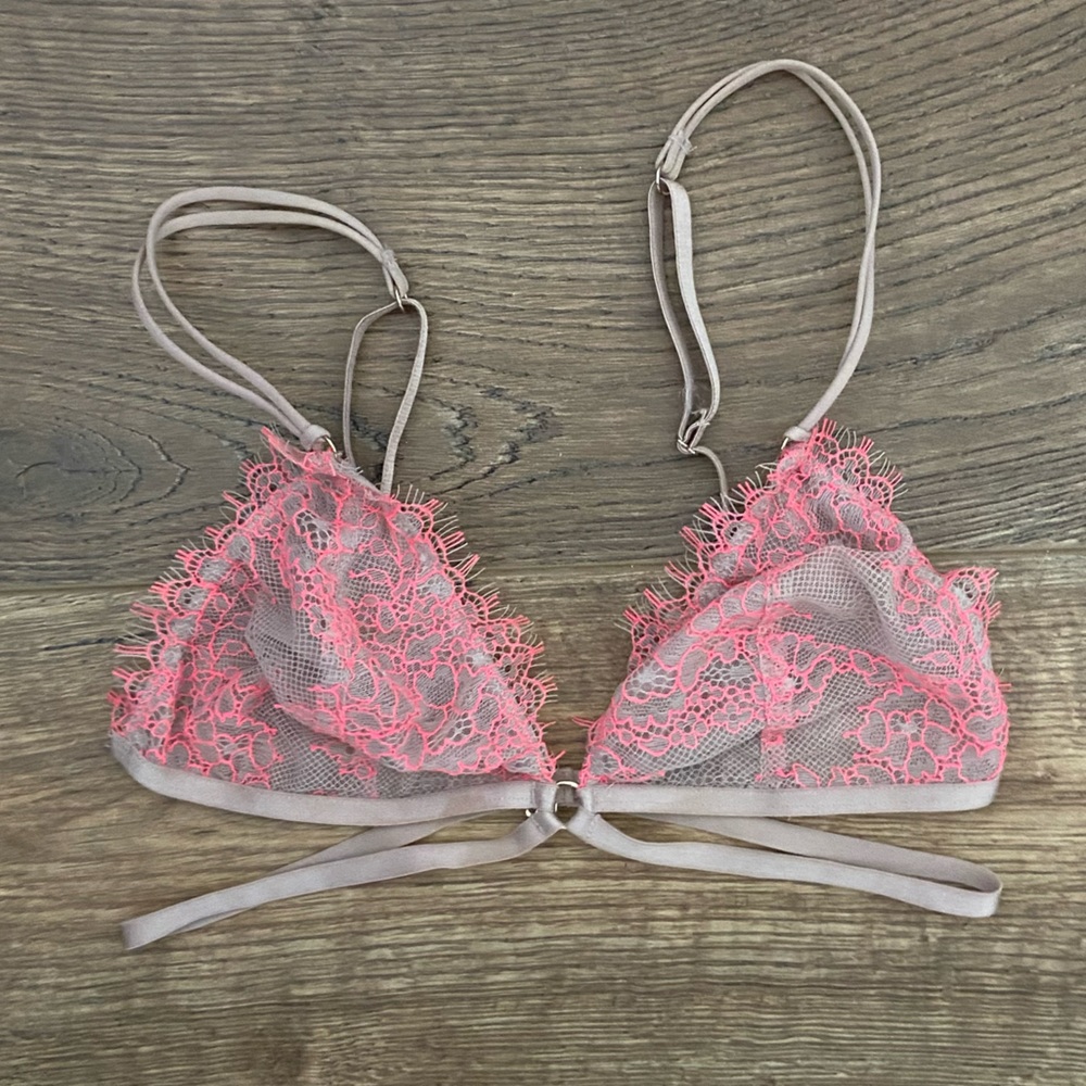 Lace bralett with neon pink stitching